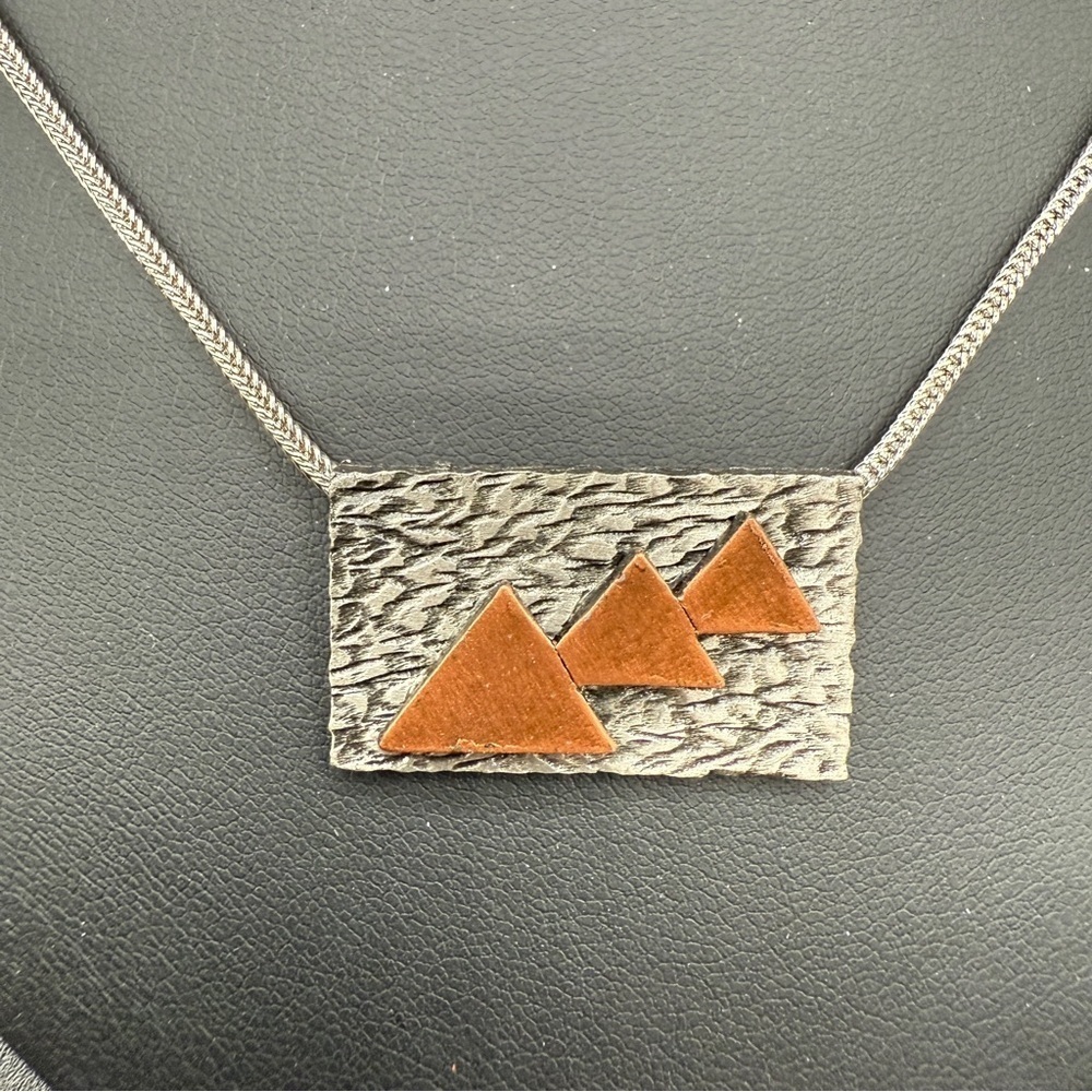 Three Sisters Mountain Metal Pendant Necklace in Copper Metal Geometric